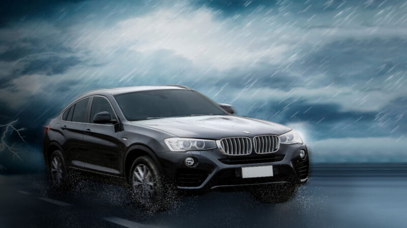 black-car-in-the-rain